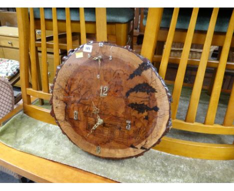 A rustic tree trunk-section wall clock