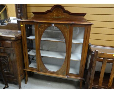 Vintage mahogany display cabinet on raised feet with large oval glass central door together with a paint decorated railback