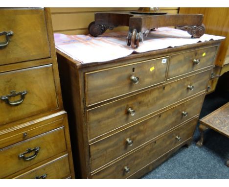 A light-wood nineteenth century chest of drawers, two short above three long with brass handles