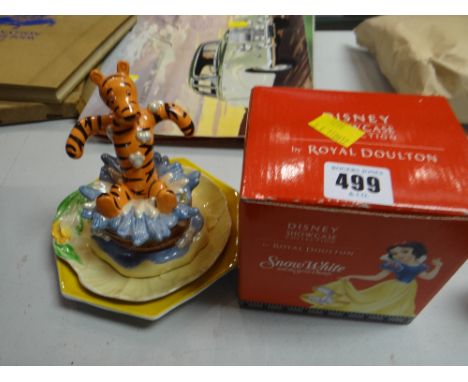 A boxed Royal Doulton 'Grumpy' Snow White character together with a Royal Doulton Winnie the Pooh 'Tigger' figure together wi