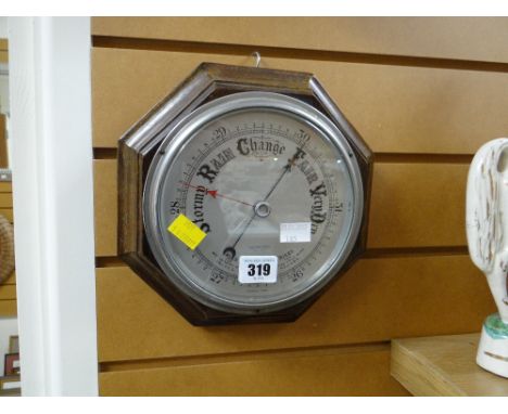 An octagonal oak barometer
