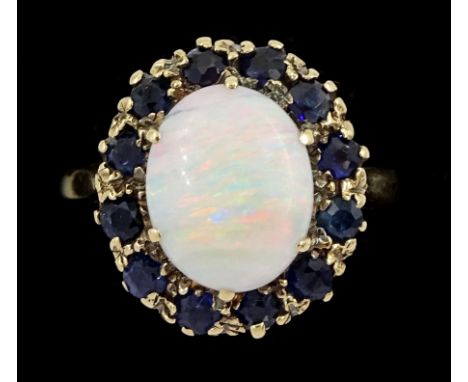 Gold opal and sapphire cluster ring, stamped 9ctCondition Report:Approx 3.75gm, size J-K, head = 15mm x 13mm, some light rubb