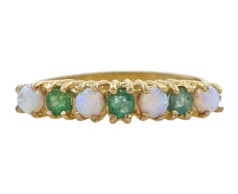 9ct gold seven stone opal and emerald ring, hallmarkedCondition Report:Approx 2gm, size N, good condition