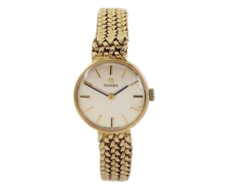 Omega ladies 9ct gold manual wind wristwatch, on integral 9ct gold bracelet, hallmarkedCondition Report:Approx 19.05gm (inclu