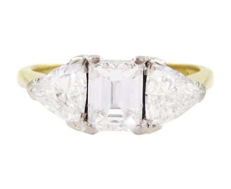 18ct gold three stone emerald cut and trillion cut diamond ring, Birmingham 1998, principal diamond approx 1.15 carat, each t