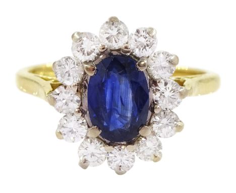 18ct gold oval sapphire and round brilliant cut diamond cluster ring, Birmingham 1994, sapphire approx 1.00 carat, total diam