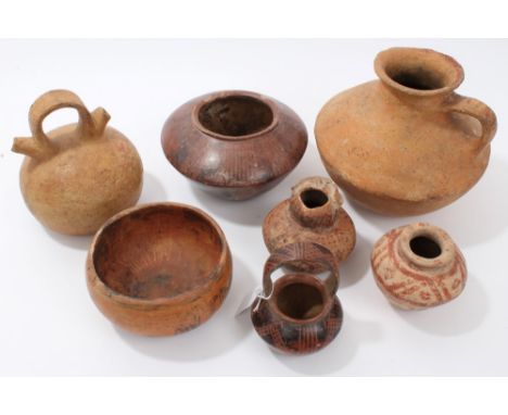 Collection of seven Ancient pre-Columbian pottery vessels - including polychrome wares and vase with mask spout