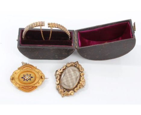 Victorian Etruscan revival oval target brooch with seed pearl and blue enamel star motif, in fitted box, Victorian mourning b