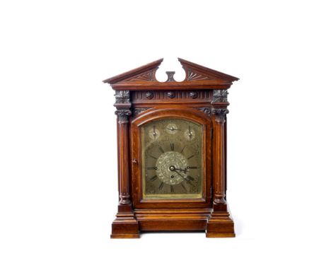 Victorian bracket clock with Westminster chiming movement, domed brass dial with engraved foliate decoration and Roman numera