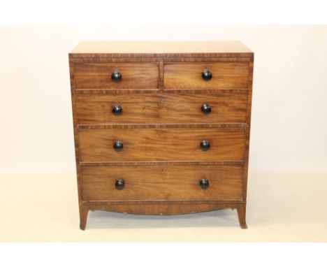 Regency mahogany chest of drawers with two short over three long graduated drawers, on splayed bracket feet