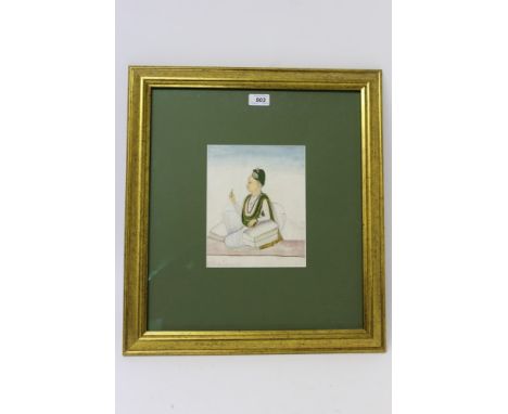 Indian School (18th century), watercolour - portrait of a nobleman in traditional attire, reclining on cushions, 22cm x 17cm.