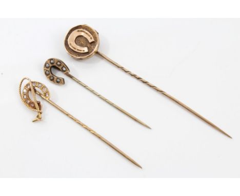 Group of three Victorian stick pins of sporting interest - to include diamond set horseshoe and riding crop, seed pearl horse