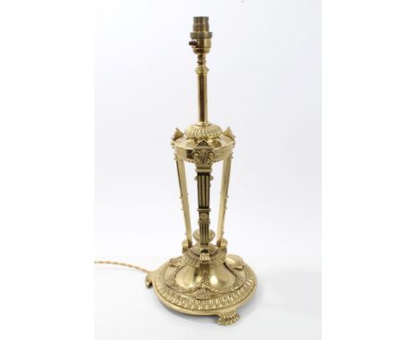 Good quality brass table lamp with reeded pilasters and leaf swags, on scroll feet, 50cm
