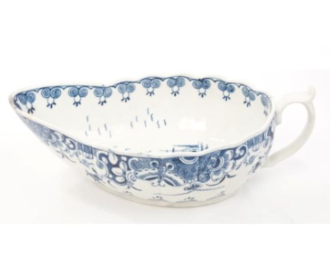 18th century Worcester fluted blue and white sauce boat with painted doughnut tree and Chinese landscape and butterfly decora