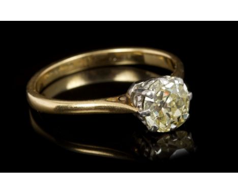 Diamond single stone ring, the old cut diamond of pale-yellow tint, estimated to weigh approximately 1.17 carats, in claw set