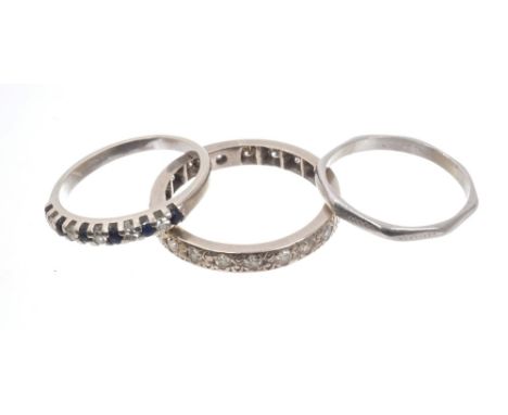 Three rings - to include a diamond eternity ring with a full band of single cut diamonds, tests as 18ct white gold.  Ring siz