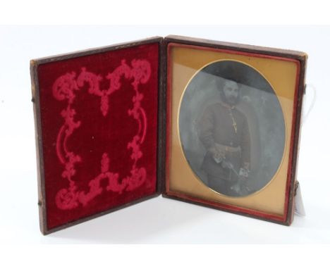 Victorian ambrotype photograph on glass of a British Army Major in uniform, with sword with gilt highlights, in original tool