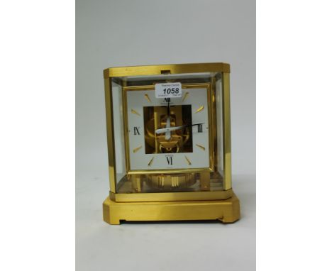 1980s 528 - 8 calibre Atmos clock with square white dial with Roman numerals, signed - Jaeger-LeCoultre, Atmos and white / bl