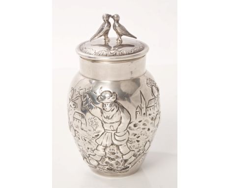 Late 19th century Continental, possibly Austro-Hungarian silver tea caddy of elongated baluster form, with embossed panel dep