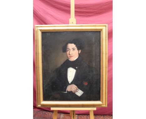 Mid-19th century English School oil on canvas - portrait of a young man holding a letter, in gilt frame, 75cm x 62.5cm