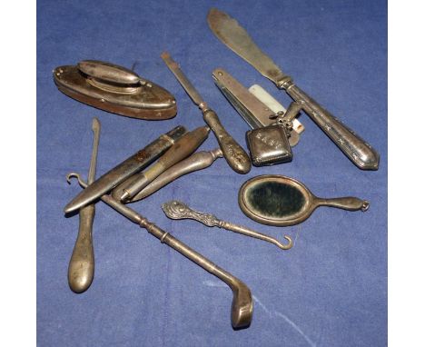 A selection of novelty and miniature silver items including golf club button hook; baby rattle; miniature mirror; etc.