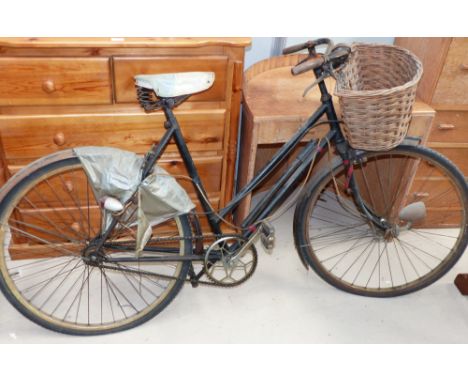 A vintage ladies bicycle, circa 1950