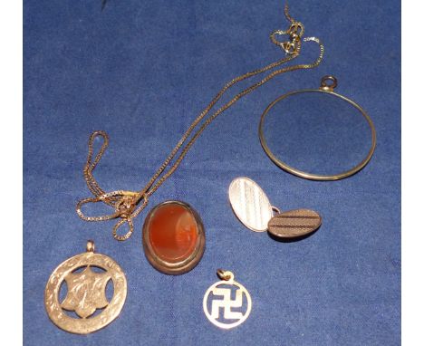 A 9ct hallmarked gold chased medallion; a 9 ct cufflink; a chain stamped '9ct'; a 9 ct fine box chain necklace; a seal; a mon
