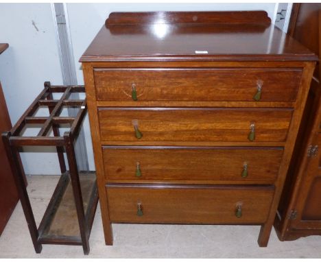 A 1930's oak 4-height chest of drawers; an oak stick stand