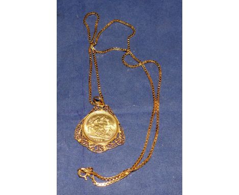A 1980 sovereign pendant in filigree mount on box chain, stamped '22K'