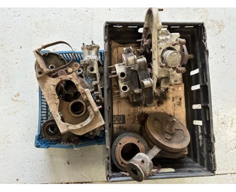 A box of mixed engine casings and various internals.