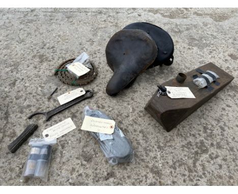 A collection of early Calthorpe motorcycle parts including a petrol tank, circa 1916, a saddle, 1915, a flywheel spanner, two