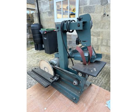 A Pinnacle 1" and 8" belt and disc sander.