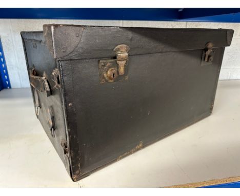 A Barker car trunk, with fold down front.