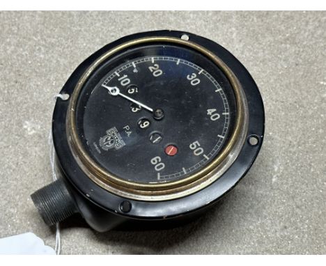 A Smiths black faced 0-60mph speedometer to suit Austin 7 or similar, appears restored.