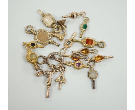 Sixteen assorted 19th century yellow metal overlaid and mainly gem set small watch keys, including chalcedony, citrine, ameth