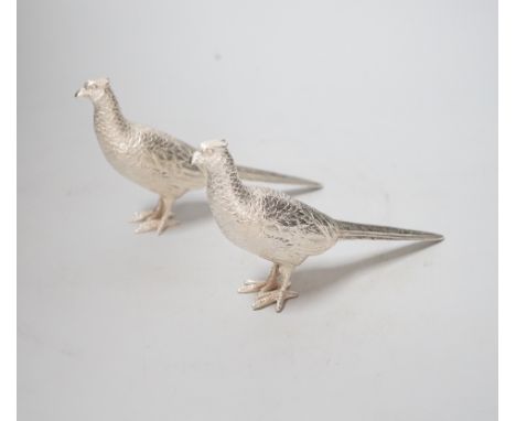 A pair of Elizabeth II silver model free-standing pheasants, by Albert Edward Jones, London, 1973, length 16cm, 9.6oz.