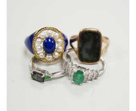 A modern 750 white metal and three stone gem set ring, two 9ct gold and gem set rings including lapis and seed pearl and one 