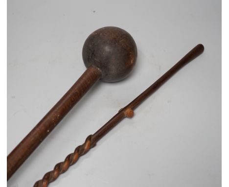 A knobkerrie and another tribal carving, longest 99cm