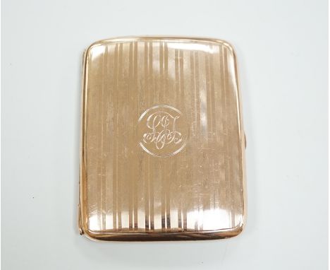 A George V 9ct gold cigarette case, 82mm, gross weight 69 grams.