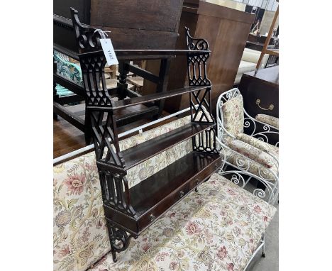 A reproduction George III style mahogany fretwork wall bracket, width 62cm, depth 17cm, height 88cm
