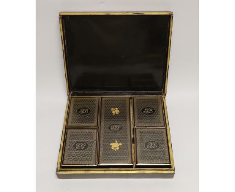 A Victorian gaming set with mother of pearl counters, contained in a mid 19th century Canton gilt decorated like a box with l