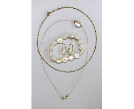 A modern suite of 750, diamond and button cultured pearl set jewellery, comprising a necklet and pair of earrings, together w