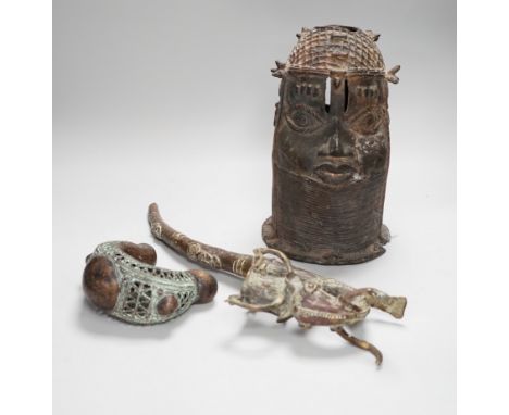 West African bronzes: Benin, a male and a female head, bangle anklet, a ceremonial pipe, ornamental ladle (5)