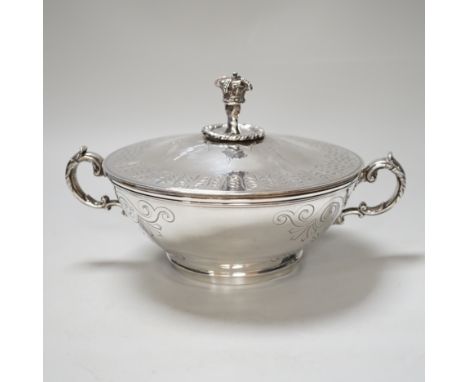 A Victorian silver tureen and cover, with hand holding crown finial and stylised anthemion engravings, makers initials W.T, L