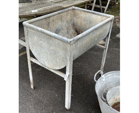 A vintage rectangular galvanised water trough, length 80cm, depth 56cm, height 82cm