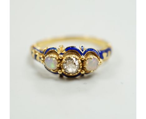 A late Victorian yellow metal, single stone diamond, two stone opal and enamelled dress ring, size K, gross weight 3 grams.