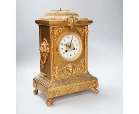 A 19th century French brass mantel clock- no pendulum, loose finial, 37cm excl finial