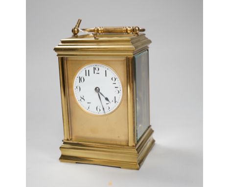 An hour repeating brass carriage clock with key, 16cm