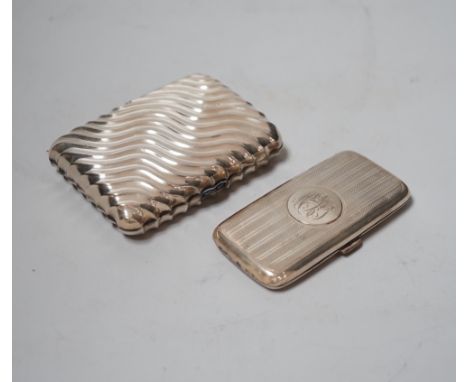 A late Victorian wrythened silver cigarette case, 88mm and a smaller silver cigarette case.