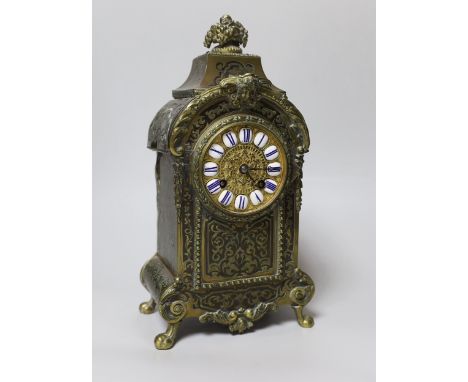 A late 19th century French brass boullework mantel clock, with key and pendulum, 30cm high